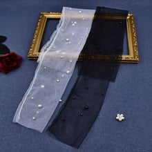 Load image into Gallery viewer, a picture frame with pearls and pearls on it