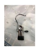 Load image into Gallery viewer, a close up of a metal object on a cloth