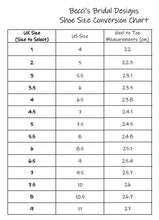 Load image into Gallery viewer, a table with numbers and measurements for shoes
