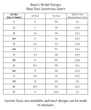 Load image into Gallery viewer, a table with measurements for a shoe size chart
