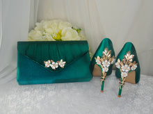 Load image into Gallery viewer, a pair of green high heels and a green purse
