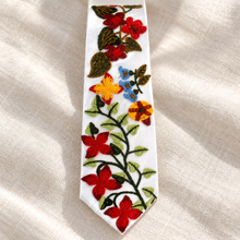 Load image into Gallery viewer, Wildflower Wedding Tie – White Satin Necktie with Red, Gold &amp; Blue Floral Embroidery
