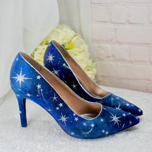 Load image into Gallery viewer, a pair of blue shoes with stars painted on them
