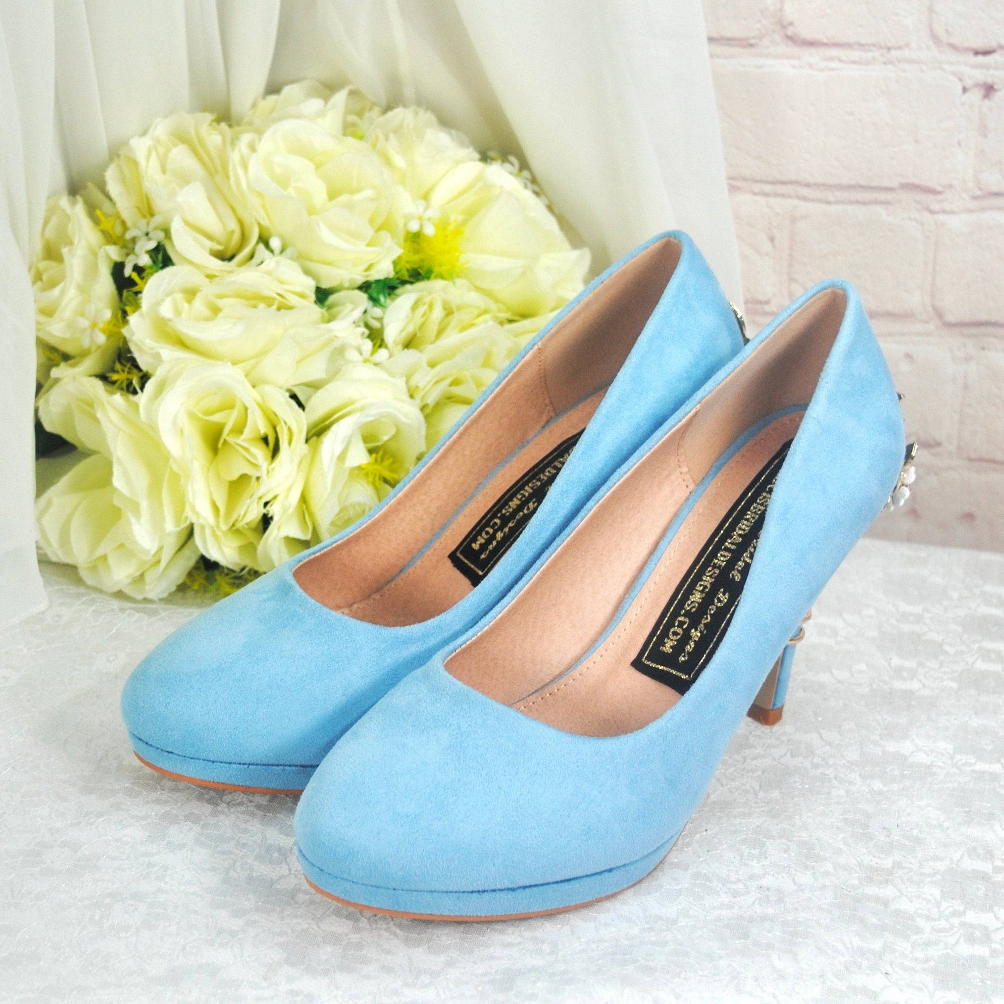 Pale blue shoes and clutch bag on sale